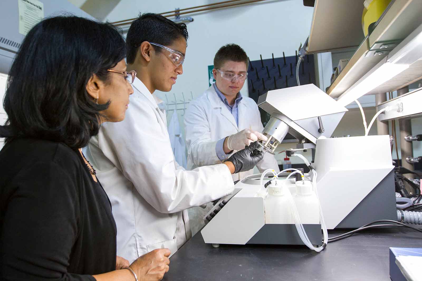 Aditi and researchers in the lab