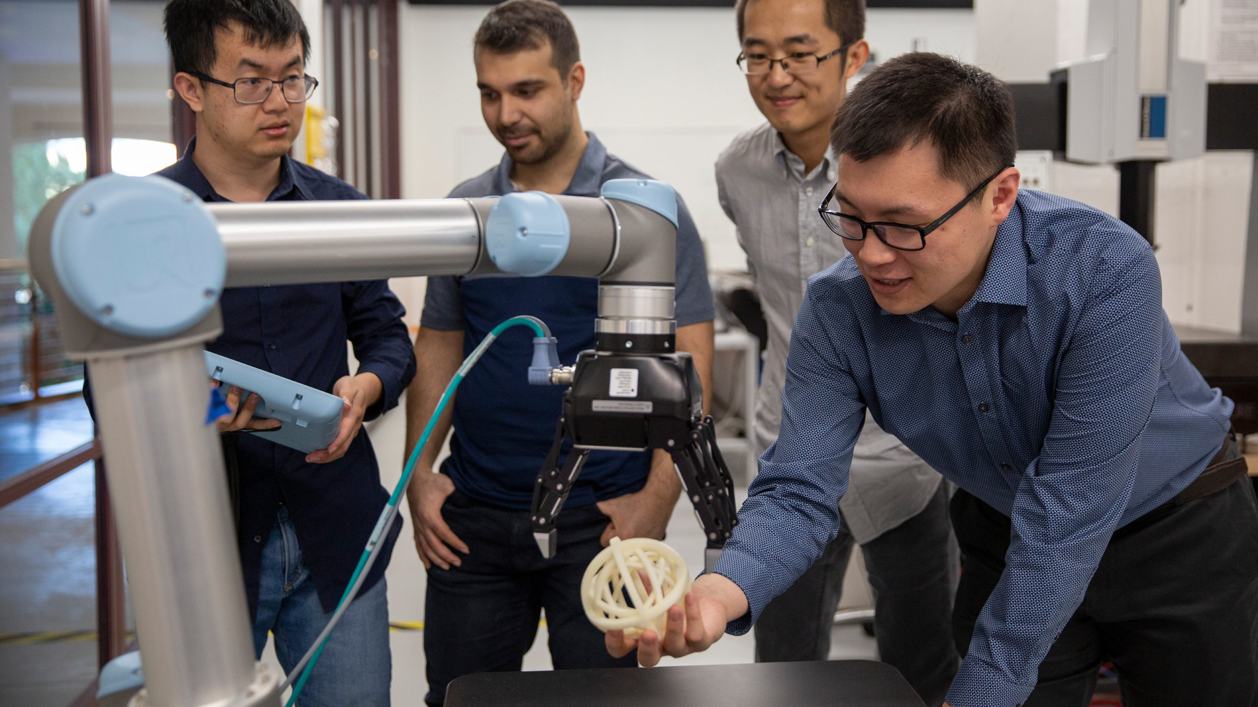 Feng Ju and his team at ASU's Manufacturing and Service Automation Lab are developing data tools to advance factory operations and minimize production disruptions. Photographer: Connor McKee/ASU